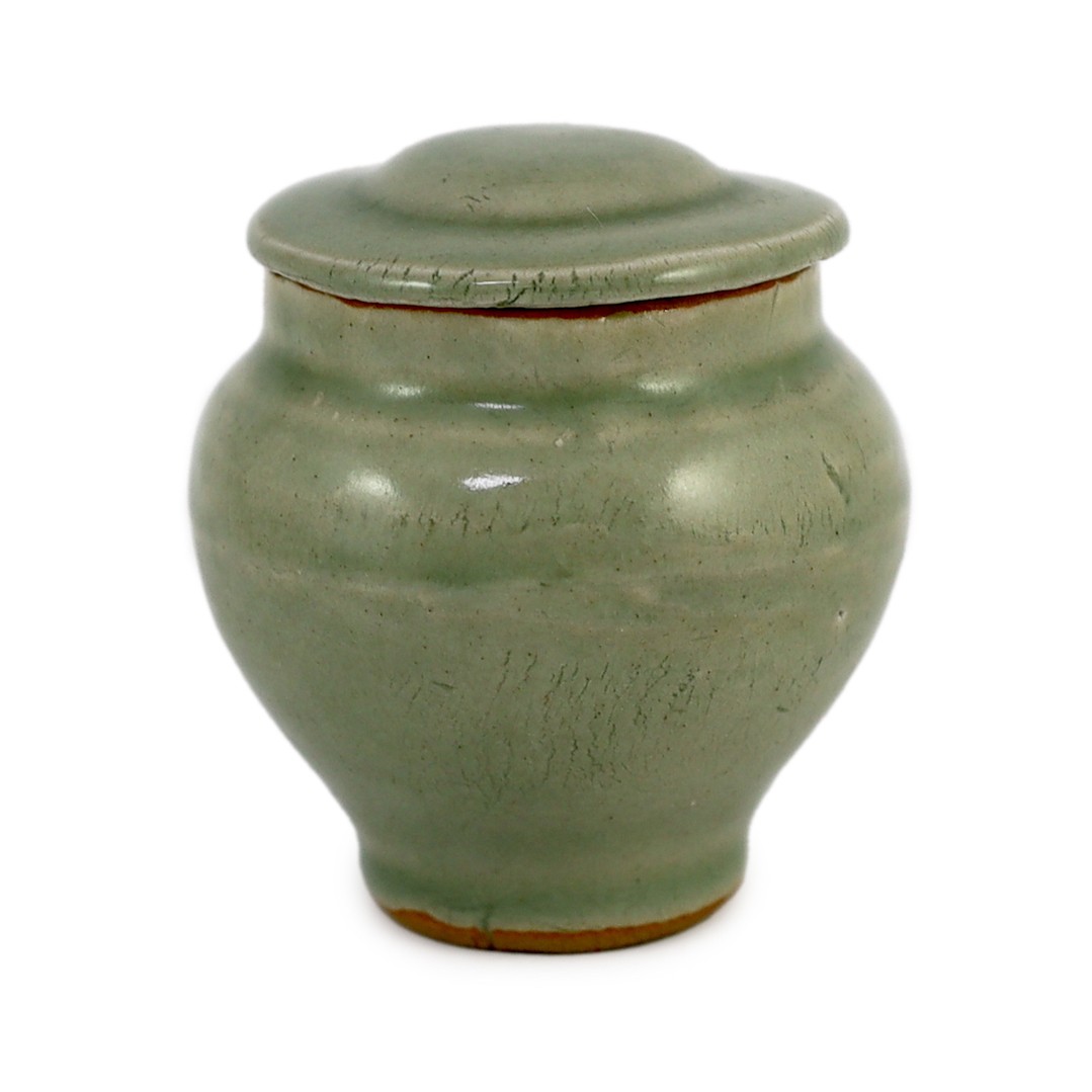 A Chinese celadon small baluster jar and cover, Southern Song dynasty or later, 8cm high